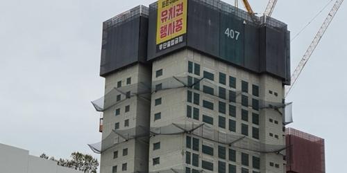 서울 둔촌주공 조합 파산 뒤 경매 우려 확산, 조합원 갈등도 일촉즉발  